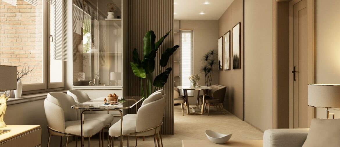 a living room filled with furniture and a dining room table