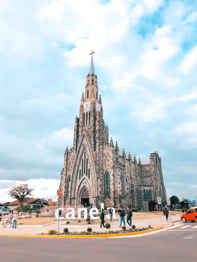 people walking near gray concrete building during daytime