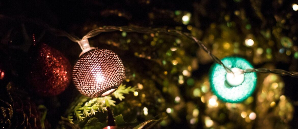 A close up of a christmas ornament on a tree