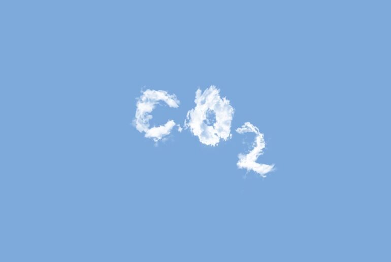 a plane flying in the sky with the word go written in it