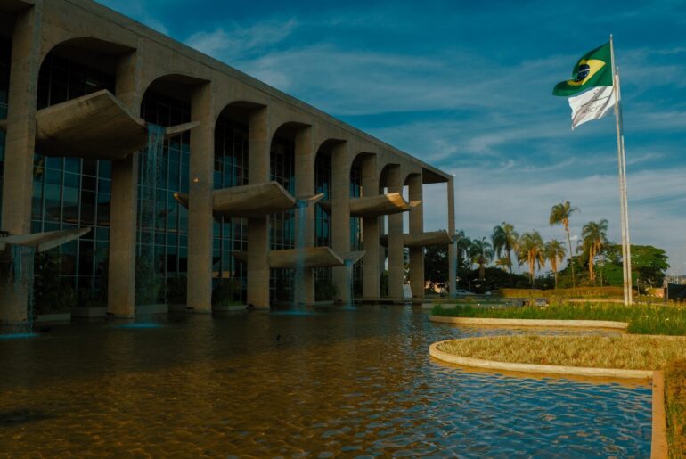 a large building with a flag on top of it